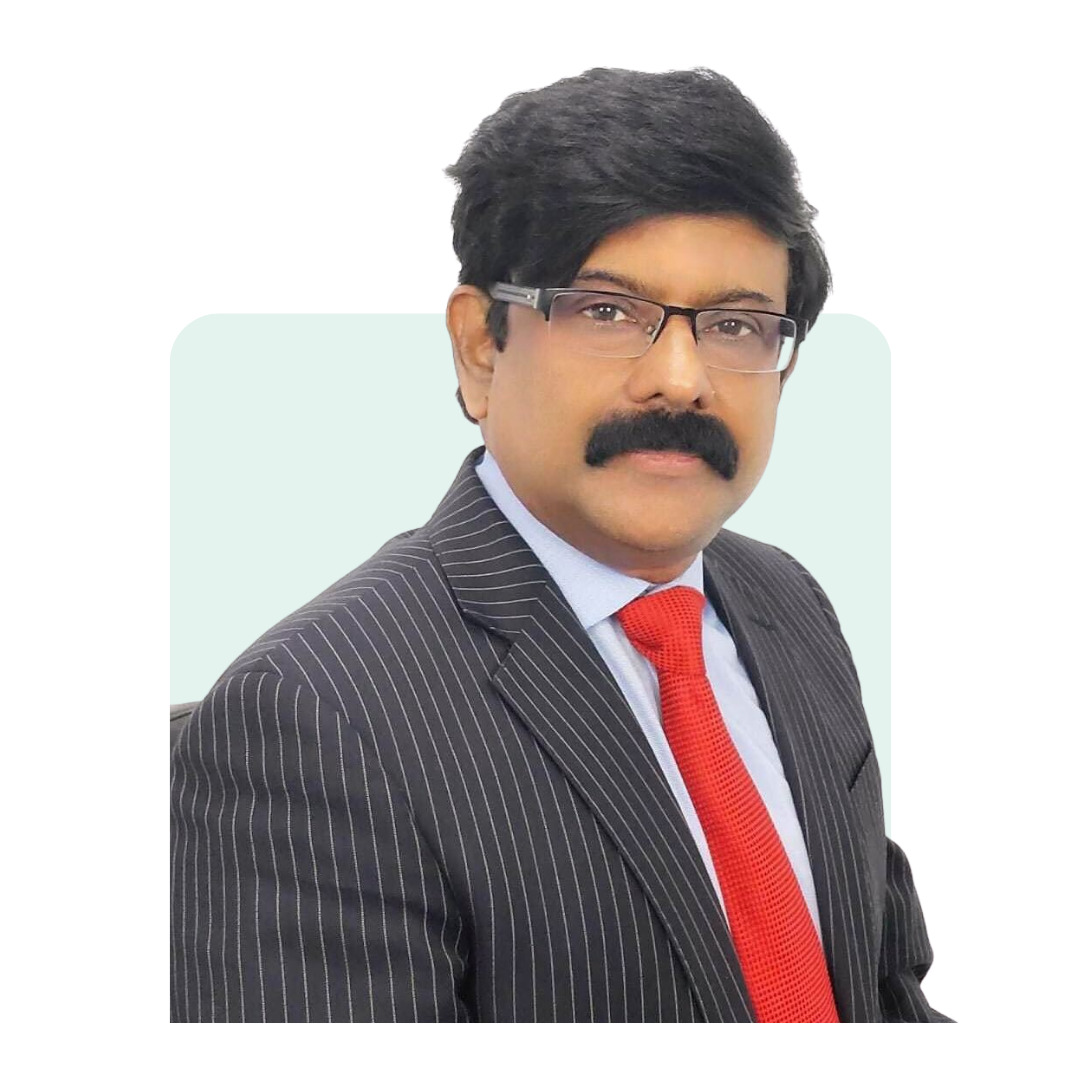 Dr Rajeswaran in a pinstripe suit